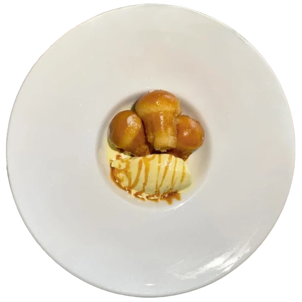 Rum babà with mascarpone and salted caramel, a dish from the Da Alcide restaurant in Venturina, Tuscany.