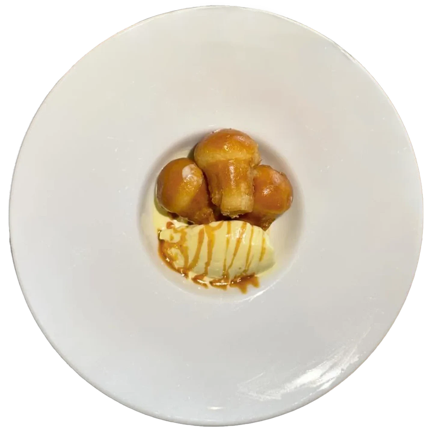 Rum babà with mascarpone and salted caramel, a dish from the Da Alcide restaurant in Venturina, Tuscany.